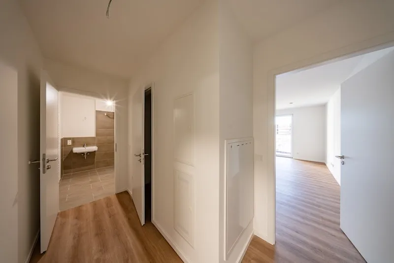 Neubauwohnung mit Fußbodenheizung und Balkon im Erstbezug / WBS 180 erforderlich — photo 1